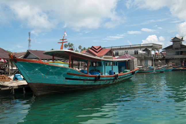 traditional wooden boat in Balai